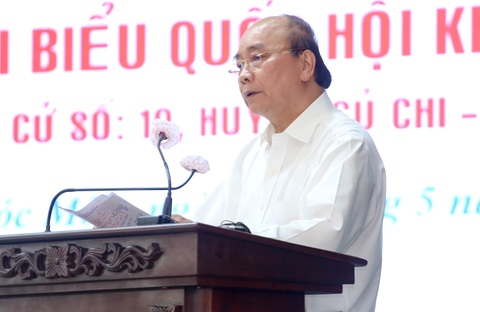 Chủ tịch nước Nguyễn Xuân Phúc: Không thể làm chính sách trong phòng lạnh - Ảnh 2. Chủ tịch nước Nguyễn Xuân Phúc: Không thể làm chính sách trong phòng lạnh - Ảnh 2.