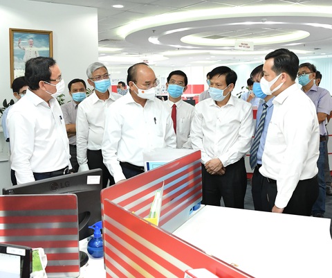 Chủ tịch nước Nguyễn Xuân Phúc thăm báo Sài Gòn Giải Phóng - Ảnh 1. Chủ tịch nước Nguyễn Xuân Phúc thăm báo Sài Gòn Giải Phóng - Ảnh 1.