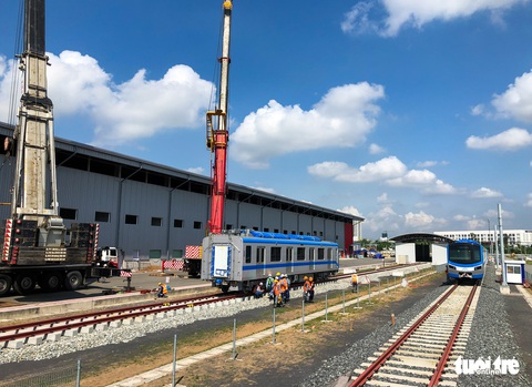 Thêm 3 toa tàu metro số 1 về depot Long Bình để chuẩn bị chạy thử nghiệm - Ảnh 6. Thêm 3 toa tàu metro số 1 về depot Long Bình để chuẩn bị chạy thử nghiệm - Ảnh 6.