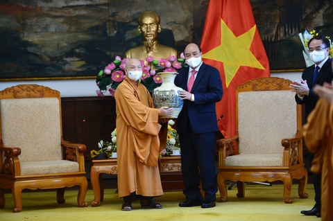 Chủ tịch nước Nguyễn Xuân Phúc: Phát huy các nguồn lực tôn giáo cho sự phát triển Việt Nam - Ảnh 2. Chủ tịch nước Nguyễn Xuân Phúc: Phát huy các nguồn lực tôn giáo cho sự phát triển Việt Nam - Ảnh 2.