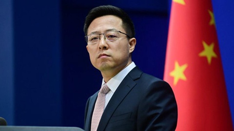 Trung Quốc hỏi ngược Mỹ: Dám để chuyên gia WHO tới Mỹ điều tra? - Ảnh 1. Trung Quốc hỏi ngược Mỹ: Dám để chuyên gia WHO tới Mỹ điều tra? - Ảnh 1.