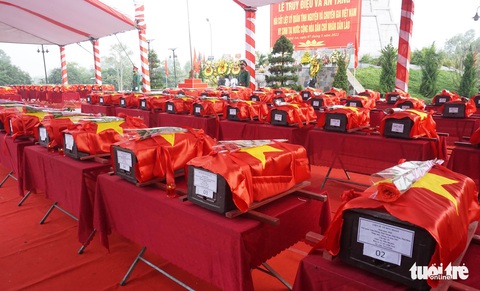 An táng 106 liệt sĩ quân tình nguyện hi sinh tại Lào - Ảnh 1. An táng 106 liệt sĩ quân tình nguyện hi sinh tại Lào - Ảnh 1.