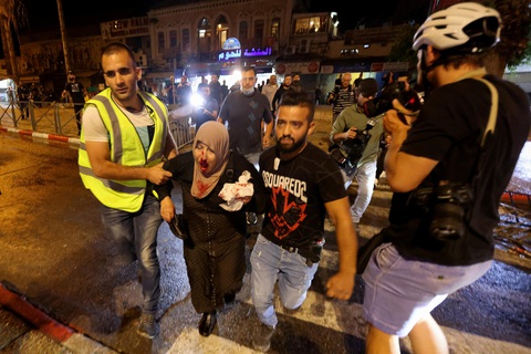 Hơn 50 người Palestine và cảnh sát Israel bị thương vì tranh chấp đêm 8-5 - Ảnh 1. Hơn 50 người Palestine và cảnh sát Israel bị thương vì tranh chấp đêm 8-5 - Ảnh 1.