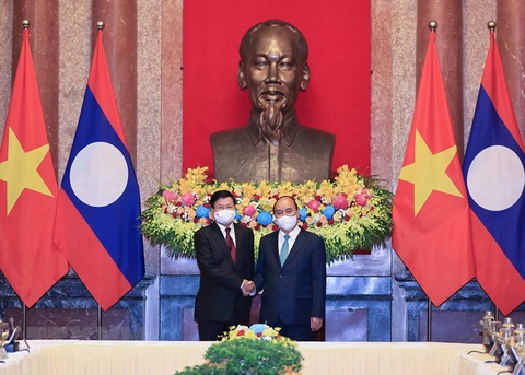Chủ tịch nước Nguyễn Xuân Phúc hội kiến Tổng bí thư, Chủ tịch nước Lào Thongloun Sisoulith - Ảnh 1. Chủ tịch nước Nguyễn Xuân Phúc hội kiến Tổng bí thư, Chủ tịch nước Lào Thongloun Sisoulith - Ảnh 1.