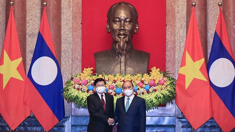 Quan hệ Việt Nam - Lào: Lúc khó khăn càng quý trọng nhau hơn - Ảnh 1. Quan hệ Việt Nam - Lào: Lúc khó khăn càng quý trọng nhau hơn - Ảnh 1.