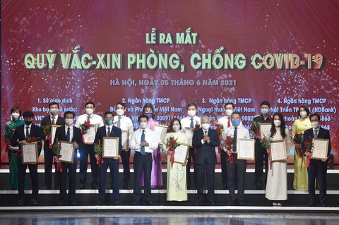 Cả nước chung tay để chiến thắng đại dịch - Ảnh 1. Cả nước chung tay để chiến thắng đại dịch - Ảnh 1.