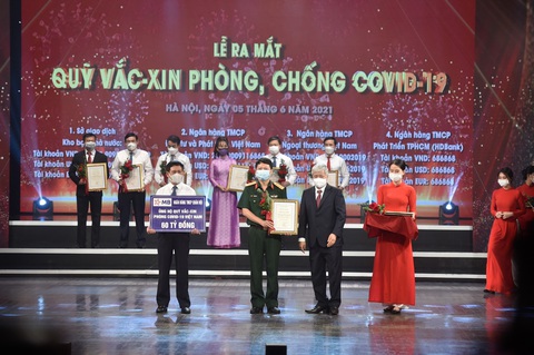 MB ủng hộ 60 tỉ đồng vào Quỹ Vắc xin phòng, chống COVID-19 - Ảnh 1. MB ủng hộ 60 tỉ đồng vào Quỹ Vắc xin phòng, chống COVID-19 - Ảnh 1.