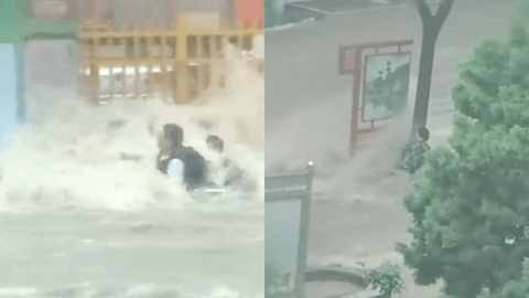 Mưa lớn nhiều nơi ở Trung Quốc: đường thành sông, dân ôm cây giữa dòng nước - Ảnh 2. Mưa lớn nhiều nơi ở Trung Quốc: đường thành sông, dân ôm cây giữa dòng nước - Ảnh 2.