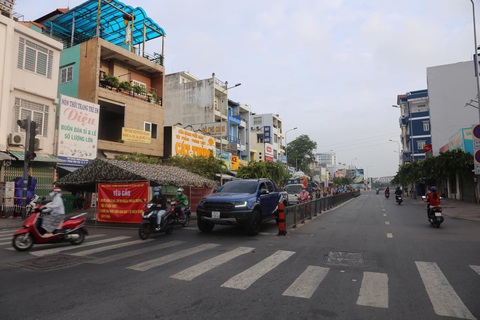 Dời chốt ở đường Nguyễn Kiệm, nới lỏng kiểm tra qua các chốt ở Gò Vấp - Ảnh 3. Dời chốt ở đường Nguyễn Kiệm, nới lỏng kiểm tra qua các chốt ở Gò Vấp - Ảnh 3.