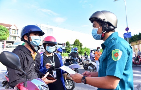 Hiểu sao cho đúng về ‘giấy thông hành’ đi lại ở TP.HCM? - Ảnh 2. Hiểu sao cho đúng về ‘giấy thông hành’ đi lại ở TP.HCM? - Ảnh 2.