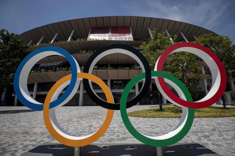 COVID-19 khiến công tác tổ chức Olympic Tokyo tốn kém nhất lịch sử - Ảnh 1. COVID-19 khiến công tác tổ chức Olympic Tokyo tốn kém nhất lịch sử - Ảnh 1.