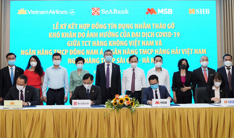 Ba ngân hàng cho Vietnam Airlines vay gói tái cấp vốn 4.000 tỉ đồng - Ảnh 1. Ba ngân hàng cho Vietnam Airlines vay gói tái cấp vốn 4.000 tỉ đồng - Ảnh 1.