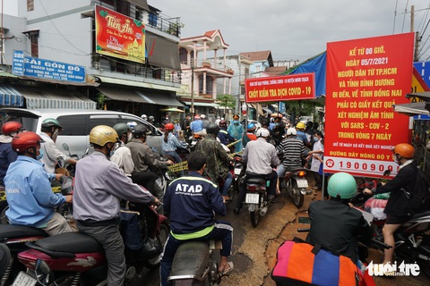 Nhiều người rời TP.HCM về quê phải quay đầu vì không có giấy xét nghiệm - Ảnh 8. Nhiều người rời TP.HCM về quê phải quay đầu vì không có giấy xét nghiệm - Ảnh 8.