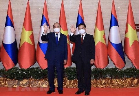 Chủ tịch nước Nguyễn Xuân Phúc: Quan hệ Việt - Lào cao hơn các hiệp định, hiệp ước - Ảnh 1. Chủ tịch nước Nguyễn Xuân Phúc: Quan hệ Việt - Lào cao hơn các hiệp định, hiệp ước - Ảnh 1.