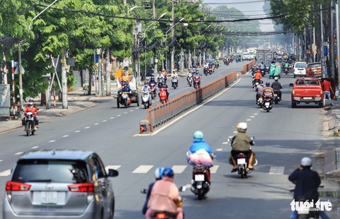 Đường phố TP.HCM tấp nập trở lại - Ảnh 19. Đường phố TP.HCM tấp nập trở lại - Ảnh 19.