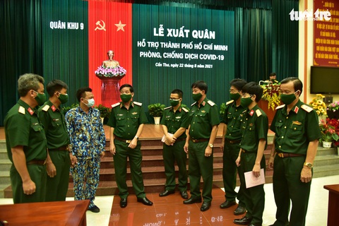 Quân khu 9 xuất quân hỗ trợ TP.HCM chống dịch - Ảnh 1. Quân khu 9 xuất quân hỗ trợ TP.HCM chống dịch - Ảnh 1.