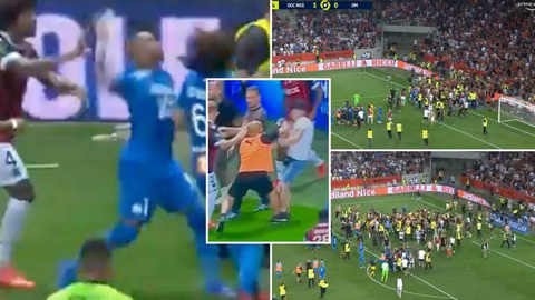 Trận Nice - Marseille bị hoãn ở phút 75 vì CĐV lao vào sân đánh nhau với cầu thủ - Ảnh 3. Trận Nice - Marseille bị hoãn ở phút 75 vì CĐV lao vào sân đánh nhau với cầu thủ - Ảnh 3.