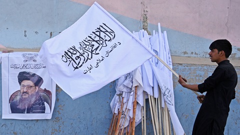 Taliban từ cầm súng sang cầm quyền - Ảnh 1. Taliban từ cầm súng sang cầm quyền - Ảnh 1.