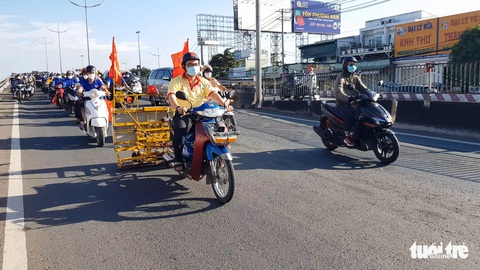 Đầu năm quét đinh rải dọc quốc lộ 1 khu Bình Chánh - Ảnh 1. Đầu năm quét đinh rải dọc quốc lộ 1 khu Bình Chánh - Ảnh 1.