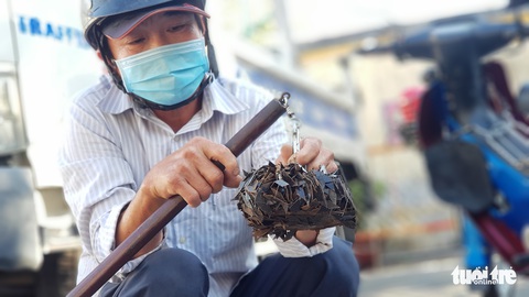 Đầu năm quét đinh rải dọc quốc lộ 1 khu Bình Chánh - Ảnh 8. Đầu năm quét đinh rải dọc quốc lộ 1 khu Bình Chánh - Ảnh 8.
