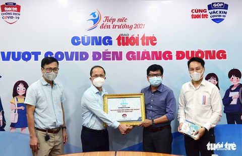 Nhà xuất bản Trẻ góp Quỹ phòng chống COVID-19 qua báo Tuổi Trẻ từ tiền phát hành sách - Ảnh 1. Nhà xuất bản Trẻ góp Quỹ phòng chống COVID-19 qua báo Tuổi Trẻ từ tiền phát hành sách - Ảnh 1.
