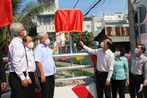 Vượt khó đại dịch, quận 7 khánh thành 14 công trình kịp cho dân đón Tết - Ảnh 1. Vượt khó đại dịch, quận 7 khánh thành 14 công trình kịp cho dân đón Tết - Ảnh 1.
