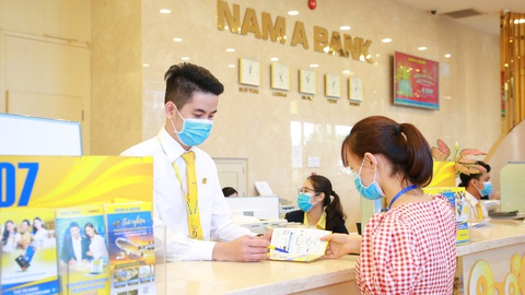 Ngân hàng không nghỉ tết - Ảnh 2. Ngân hàng không nghỉ tết - Ảnh 2.