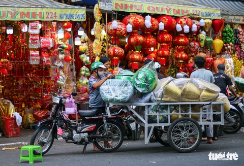 Chợ Tài lộc ở TP.HCM rực rỡ đón Tết - Ảnh 8. Chợ Tài lộc ở TP.HCM rực rỡ đón Tết - Ảnh 8.