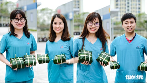 Y bác sĩ bệnh viện COVID-19 tại Hà Nội gói bánh chưng đón Tết - Ảnh 3. Y bác sĩ bệnh viện COVID-19 tại Hà Nội gói bánh chưng đón Tết - Ảnh 3.