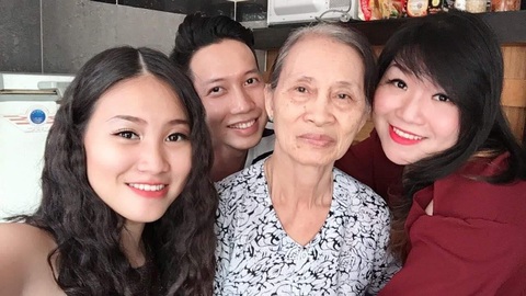 Cùng gia đình tiếp nối truyền thống nhà tôi 3 đời gói bánh chưng, bánh tét - Ảnh 1. Cùng gia đình tiếp nối truyền thống nhà tôi 3 đời gói bánh chưng, bánh tét - Ảnh 1.