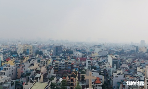 TP.HCM, Hà Nội sương mù từ sáng tới trưa - Ảnh 1. TP.HCM, Hà Nội sương mù từ sáng tới trưa - Ảnh 1.