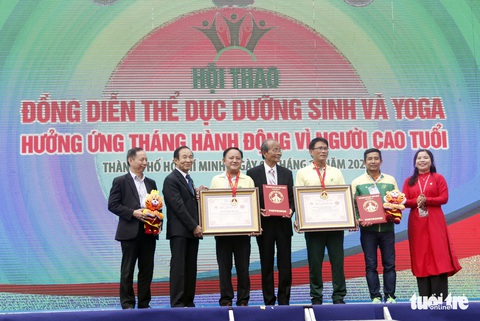 Xác lập kỷ lục Việt Nam tại ngày hội dưỡng sinh, yoga TP.HCM - Ảnh 6. Xác lập kỷ lục Việt Nam tại ngày hội dưỡng sinh, yoga TP.HCM - Ảnh 6.