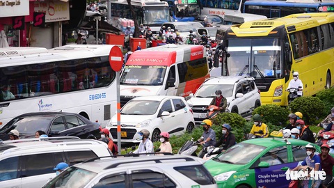 Lo hệ lụy khi xe khách vào trung tâm thành phố - Ảnh 1. Lo hệ lụy khi xe khách vào trung tâm thành phố - Ảnh 1.