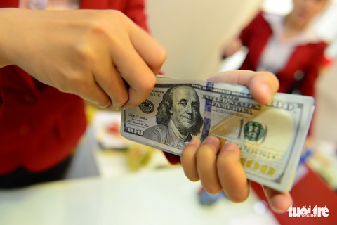 Giá USD tự do dịu lại sau khi Ngân hàng Nhà nước TP.HCM yêu cầu kiểm tra - Ảnh 1. Giá USD tự do dịu lại sau khi Ngân hàng Nhà nước TP.HCM yêu cầu kiểm tra - Ảnh 1.