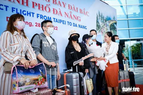 Đà Nẵng đón những du khách đầu tiên từ Đài Loan sau dịch COVID-19 - Ảnh 1. Đà Nẵng đón những du khách đầu tiên từ Đài Loan sau dịch COVID-19 - Ảnh 1.