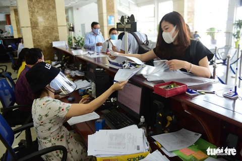 Cần cách tính mức giảm trừ gia cảnh mới - Ảnh 1. Cần cách tính mức giảm trừ gia cảnh mới - Ảnh 1.