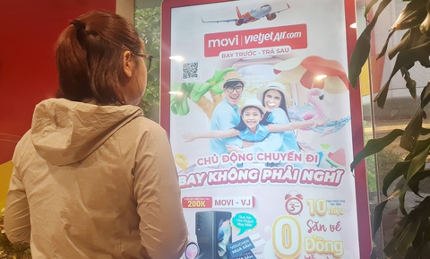 Vé trả góp giúp người lao động dễ dàng về quê - Ảnh 1. Vé trả góp giúp người lao động dễ dàng về quê - Ảnh 1.