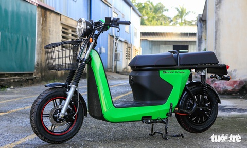 Start-up Việt Nam ra mắt xe máy điện, có trạm đổi pin tự động, nhắm đến khách hàng shipper - Ảnh 1. Start-up Việt Nam ra mắt xe máy điện, có trạm đổi pin tự động, nhắm đến khách hàng shipper - Ảnh 1.