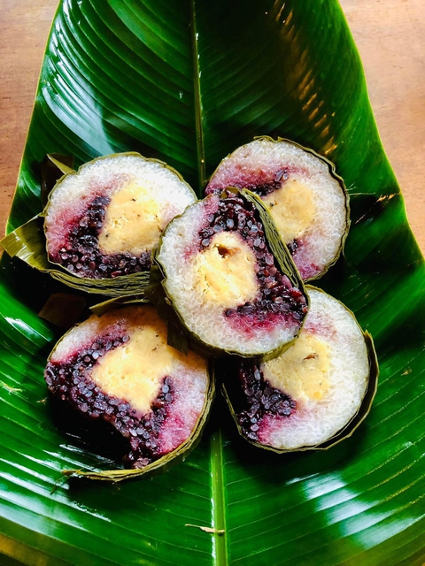 Bánh tét Chăm thoáng hương trong ngày Tết Việt - Ảnh 1. Bánh tét Chăm thoáng hương trong ngày Tết Việt - Ảnh 1.
