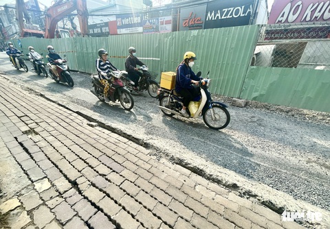 Cuối năm, thấy đường sá ở TP.HCM bị xới tung mà phát ngán - Ảnh 7. Cuối năm, thấy đường sá ở TP.HCM bị xới tung mà phát ngán - Ảnh 7.