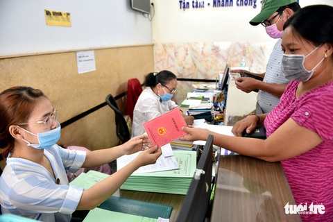 Nội dung nghị định của Chính phủ liên quan bỏ sổ hộ khẩu giấy từ 1-1-2023 - Ảnh 1. Nội dung nghị định của Chính phủ liên quan bỏ sổ hộ khẩu giấy từ 1-1-2023 - Ảnh 1.