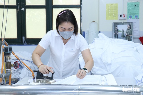 Tiền lương trung bình của lao động Việt Nam 6,5 triệu đồng/tháng - Ảnh 1. Tiền lương trung bình của lao động Việt Nam 6,5 triệu đồng/tháng - Ảnh 1.