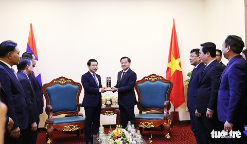 Trưởng bản tiêu biểu Việt Nam và Lào là ‘người truyền lửa’ bảo vệ biên giới - Ảnh 1. Trưởng bản tiêu biểu Việt Nam và Lào là ‘người truyền lửa’ bảo vệ biên giới - Ảnh 1.