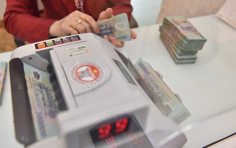 300 triệu đồng và thanh toán không tiền mặt - Ảnh 1. 300 triệu đồng và thanh toán không tiền mặt - Ảnh 1.