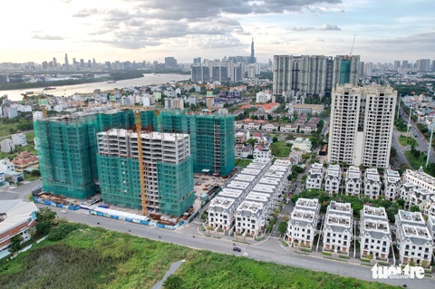 Doanh nghiệp địa ốc ráo riết mua lại trái phiếu trước hạn - Ảnh 1. Doanh nghiệp địa ốc ráo riết mua lại trái phiếu trước hạn - Ảnh 1.