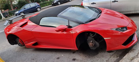 Đỗ xe ngoài đường, siêu xe Lamborghini Huracan bị trộm 4 bánh - Ảnh 1. Đỗ xe ngoài đường, siêu xe Lamborghini Huracan bị trộm 4 bánh - Ảnh 1.