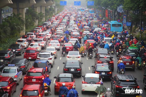 Hà Nội ngày đầu trở lại làm việc sau nghỉ Tết: Thưa vắng người dân đến làm thủ tục - Ảnh 1. Hà Nội ngày đầu trở lại làm việc sau nghỉ Tết: Thưa vắng người dân đến làm thủ tục - Ảnh 1.