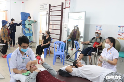 Khám hậu COVID-19 có được BHYT thanh toán? - Ảnh 1. Khám hậu COVID-19 có được BHYT thanh toán? - Ảnh 1.
