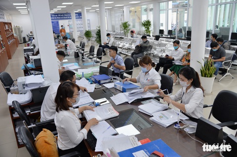 Thể chế cho TP.HCM: Áo đã chật! - Ảnh 1. Thể chế cho TP.HCM: Áo đã chật! - Ảnh 1.