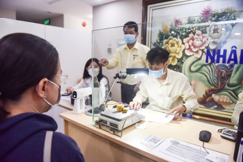 Giá vàng miếng SJC tuần tới có quay lại 70 triệu đồng/lượng? - Ảnh 1. Giá vàng miếng SJC tuần tới có quay lại 70 triệu đồng/lượng? - Ảnh 1.